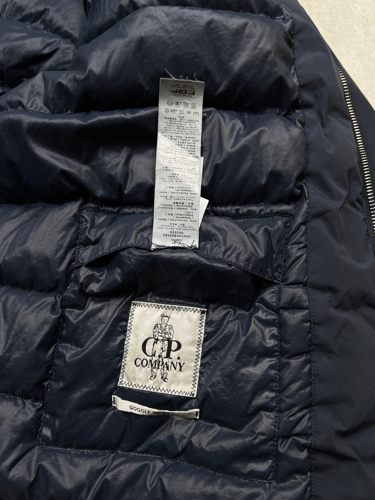 C.P. Company puffer jacket, size L, pre-owned 8/10 condition – Relique