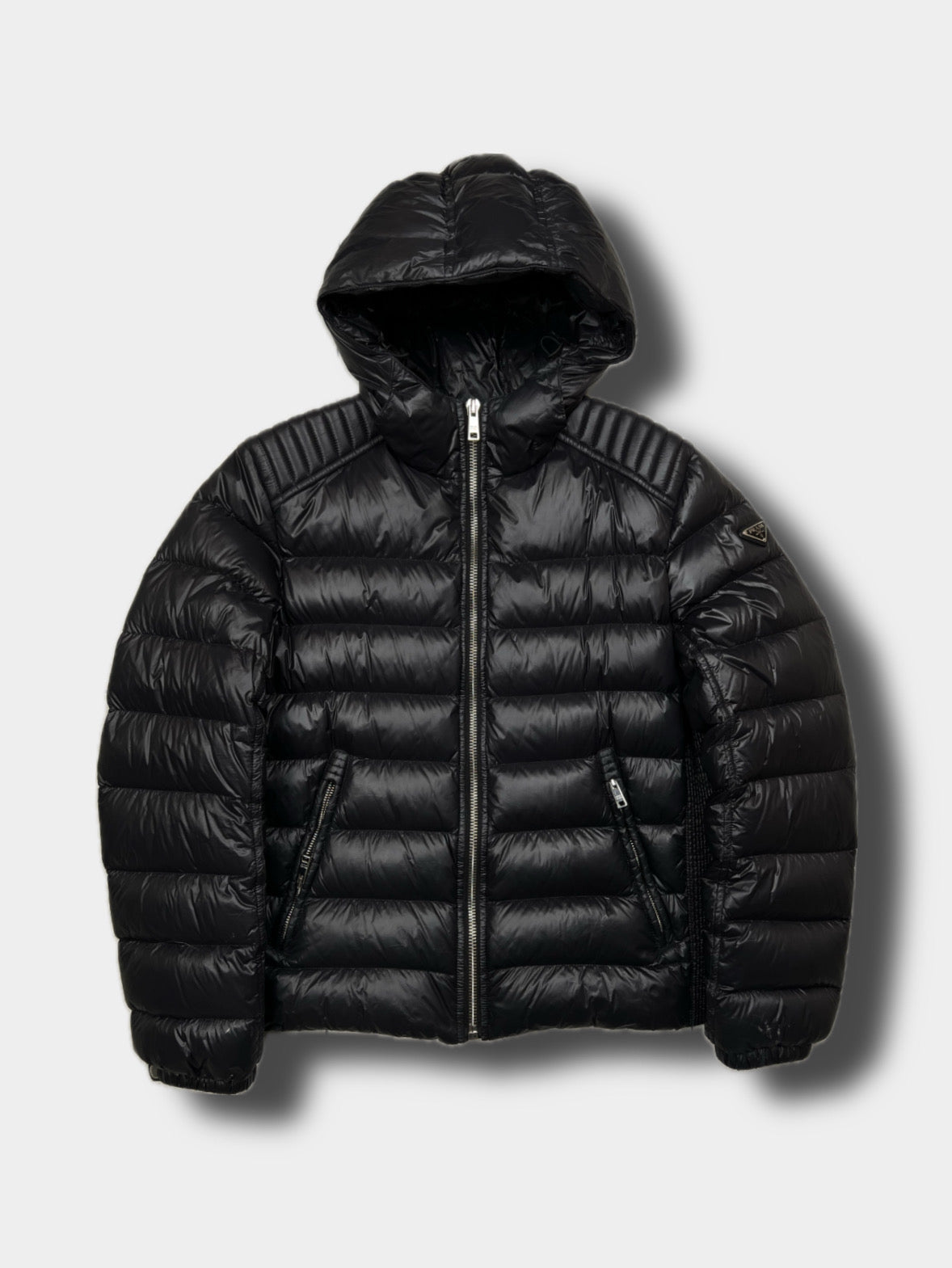 Prada puffer jacket, size 50 (fits L), pre-owned 8/10 condition (small holes on one sleeve, shown in photos) – Relique