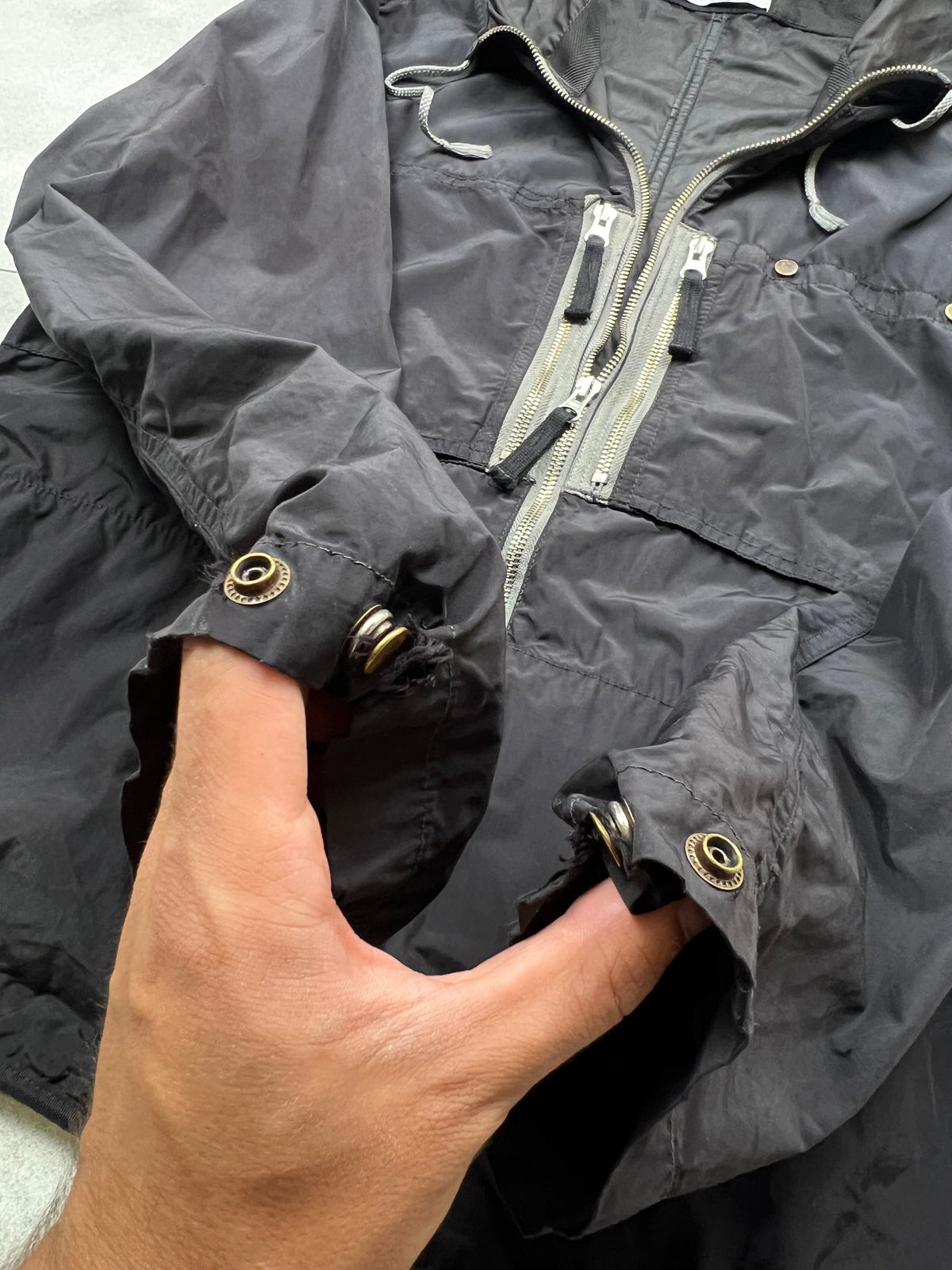 Stone Island jacket, size M, pre-owned 7/10 condition (small rips/holes shown in photos) – Relique