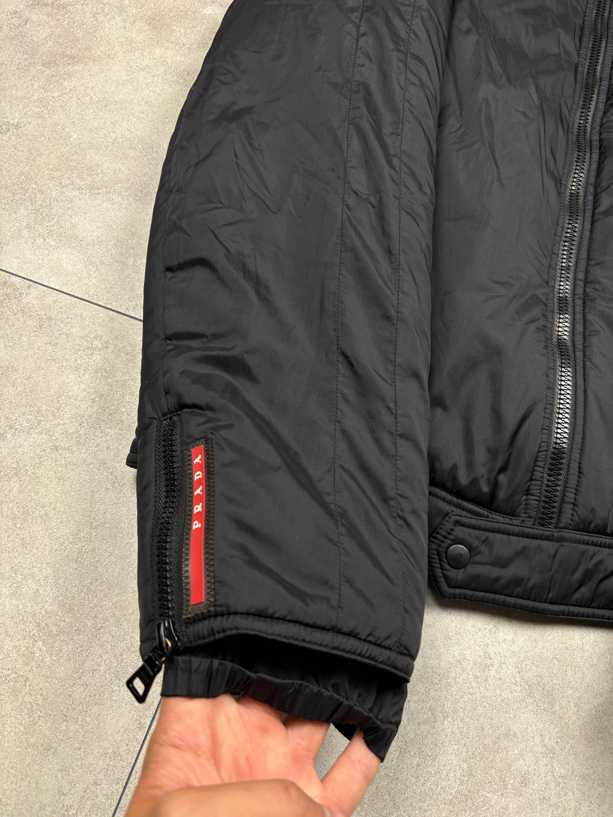 Prada puffer jacket, size 50 (fits M-L), pre-owned 10/10 condition – Relique