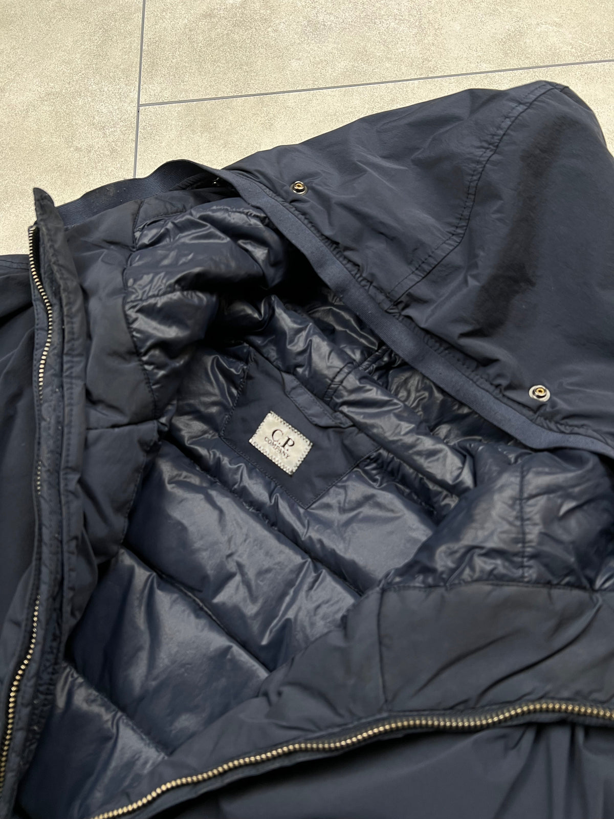 C.P. Company puffer jacket, size L, pre-owned 8/10 condition – Relique