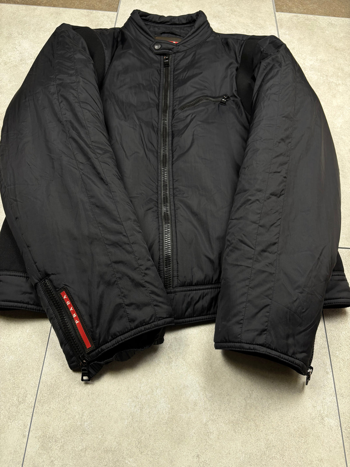 Prada puffer jacket, size 50 (fits M-L), pre-owned 10/10 condition – Relique