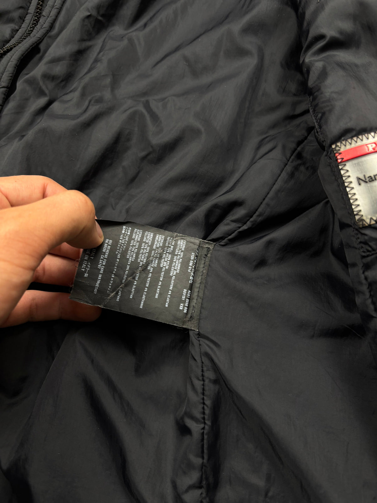Prada puffer jacket, size 50 (fits M-L), pre-owned 10/10 condition – Relique